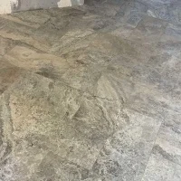 Плитка из травертина Silver Filled and Honed 1,2х30,5х61 см, серая матовая заполненная шлифованная Export
